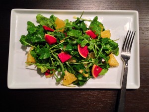 Winter salad with arugula, citrus, and watermelon radishes